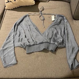 silky blue blouse with tie back